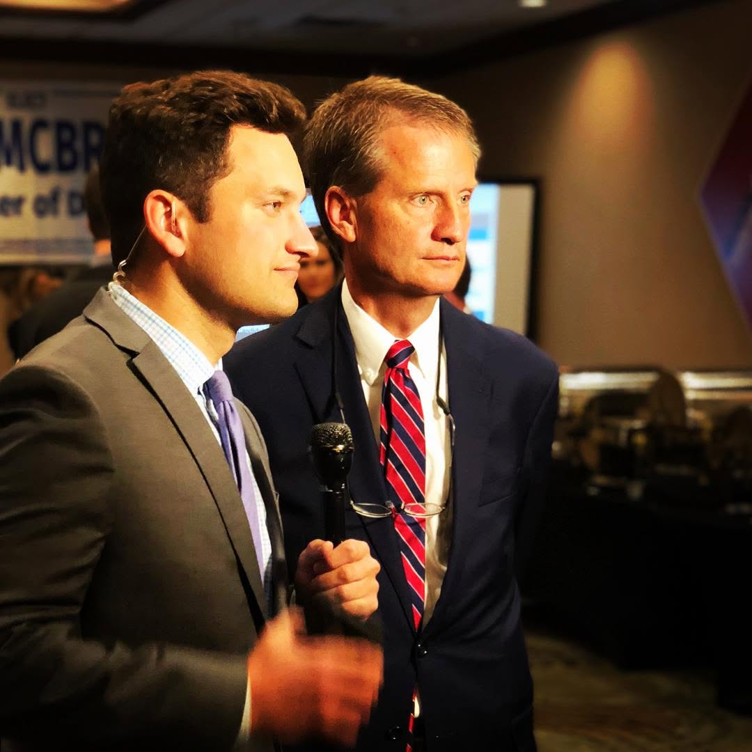 Sean Franklin reporting on camera during his television news career